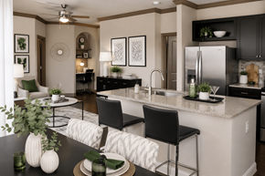 Woodbridge apartment for rent - Bright apartment dining nook set for two next to an open-concept kitchen at Stone Pointe.