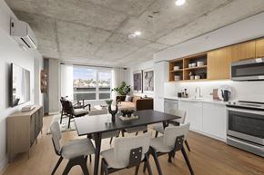 Seattle apartment for rent - A modern kitchen with a dining table and chairs.