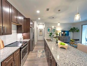New Caney apartment for rent - Kitchen with long counter at The Pointe at Valley Ranch Town Center, New Caney