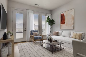 Murray apartment for rent - A living room with a couch, a chair, a coffee table, and a painting on the wall.