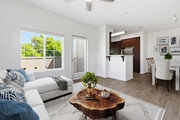 Chula Vista apartment for rent - A living room with a white couch and a coffee table in the center.