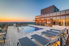 Philadelphia apartment for rent - the pool on the rooftop of a building at sunset