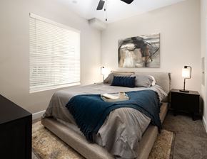 Antioch apartment for rent - a bedroom with a bed and a large window with blinds