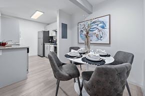 Phoenix apartment for rent - Dining area with table and chairs at The Halifax apartments in Phoenix, AZ.