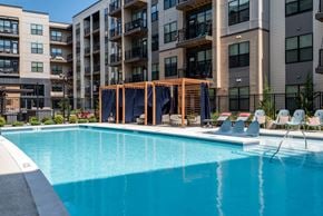Herndon apartment for rent - an image of an apartment complex with a swimming pool