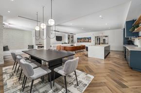 Scottsdale apartment for rent - A modern dining room with a large table and chairs.
