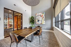 Austin apartment for rent - A conference room with a long table and chairs.