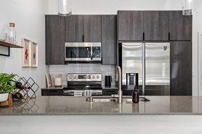 Phoenix apartment for rent - a kitchen with stainless steel appliances and a counter top