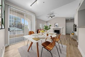 Phoenix apartment for rent - a dining room with a table and chairs and a fireplace