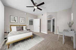 Phoenix apartment for rent - Large bedroom, carpet floors, ceiling fan with light, wall art, furnished model unit