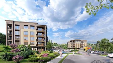 Asheville apartment for rent - A rendering of a modern apartment complex with a parking lot in front.