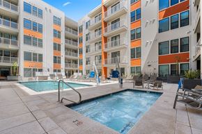 Tempe apartment for rent - a swimming pool in front of an apartment building