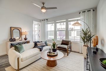 Morgan Hill apartment for rent - a living room with a white couch and a coffee table