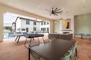 Morgan Hill apartment for rent - a large dining room with a table and chairs and a pool