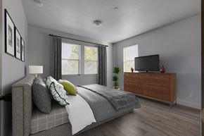 Layton apartment for rent - a bedroom with a bed and a dresser
