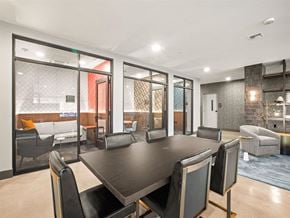 Seattle apartment for rent - a conference room with a table and chairs