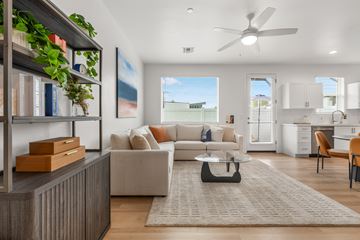 Phoenix apartment for rent - A living room with a white couch and a grey rug.