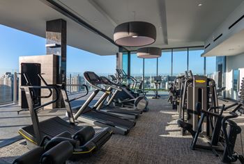 24-Hour fitness center with an outdoor fitness terrace and cutting-edge equipment