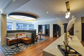 Aurora apartment for rent - a living room with a couch and a table