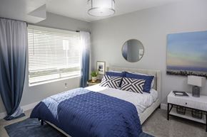 Salt Lake City apartment for rent - Bedroom with Blue and White Bed at 644 City Station, Salt Lake City, Utah
