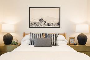 Peoria apartment for rent - the master bedroom has a bed with white sheets and pillows