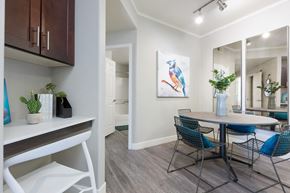 Peoria apartment for rent - a dining room area with a table and chairs and a window