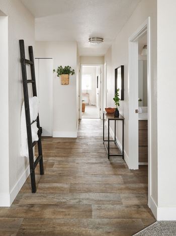 Beautiful wide-plank wood style flooring throughout living, dining and kitchen areas*