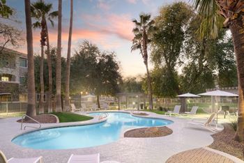 Two resort style pools with outdoor grilling area, outdoor fireplace and spa