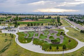 Erie apartment for rent - A park with a playground and a walking path.