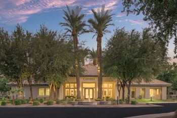 Lush landscaping with green lawns throughout