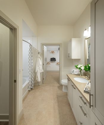 Dual-vanity countertops, walk-in showers and linen closets*