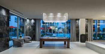 Resident clubhouse with smart tv lounge and billiards