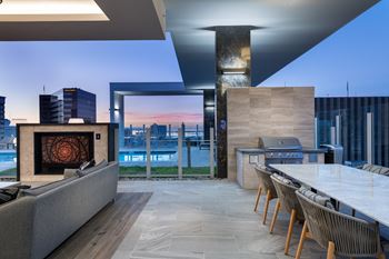 Two social courtyards with firepit, grilling and dining settings