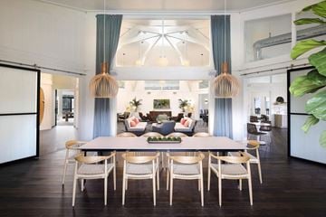 Alameda apartment for rent - a dining room with a table and chairs and a living room