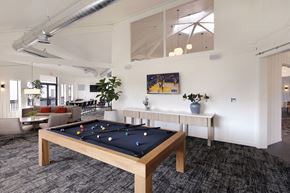 Alameda apartment for rent - a games room with a pool table in the middle