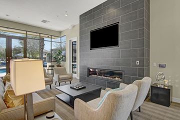 Phoenix apartment for rent - a living room with a fireplace and a television