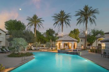 One swimming pool areas with relaxing loungers