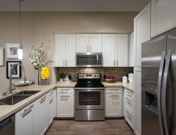 Gourmet chef kitchens with stainless steel appliances