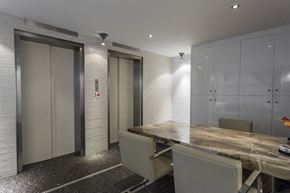 San Francisco apartment for rent - a meeting room with a wooden table and white chairs