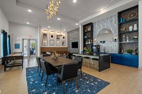Aubrey apartment for rent - A resident clubhouse with a bar and kitchen