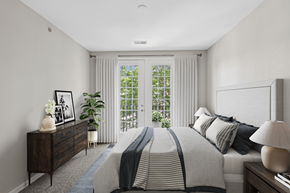 Portsmouth apartment for rent - a bedroom with a large bed and a large window