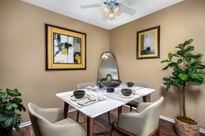 Vista apartment for rent - A dining room with a white table and chairs.
