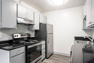 San Mateo apartment for rent - A kitchen with a stove, oven, and refrigerator.