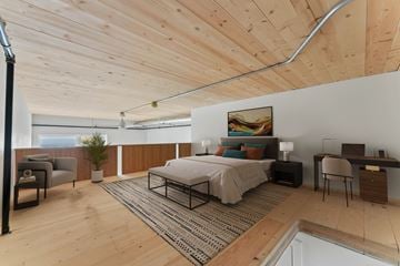 Sacramento apartment for rent - A bedroom with a bed, desk, and chair.