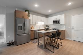 Cottage Grove apartment for rent - A kitchen with a table and chairs.