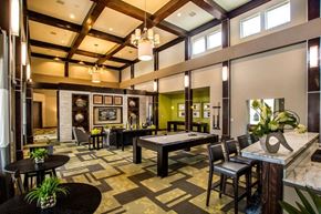 Woodbridge apartment for rent - a clubhouse with a pool table and a bar