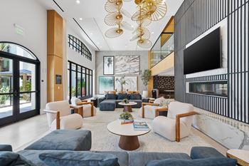 Exclusive club room featuring an indoor-outdoor lounge