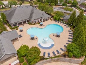 Mcdonough apartment for rent - an aerial view of an outdoor swimming pool at a resort