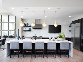 Chula Vista apartment for rent - a large kitchen with a large white island and chairs