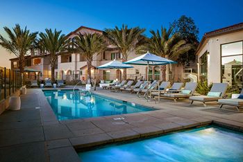 Resort style pool with lounge chairs